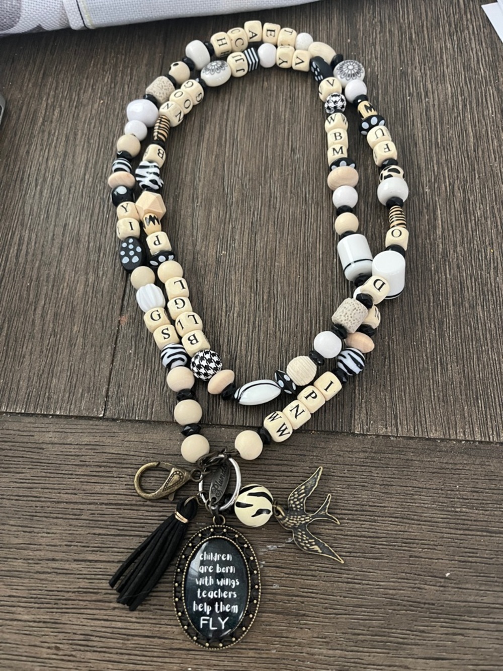 Plunder Black, White & Beige Beaded Teacher Lanyard with Tassel & Bird Charm